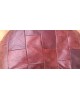 Paire de poufs vintage en patchwork de cuir bordeaux par De Sede, 1970