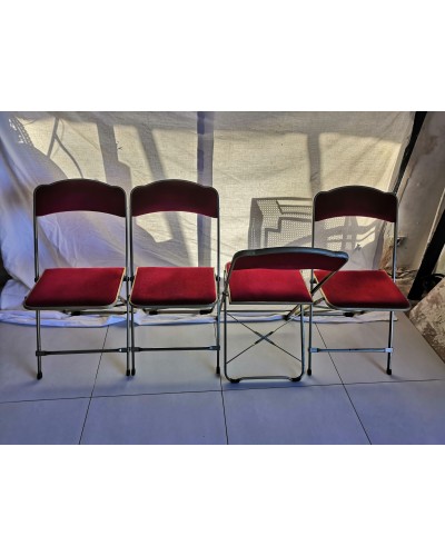 Suite de 4 chaises pliantes Opéra velours rouge et structure laiton Vintage