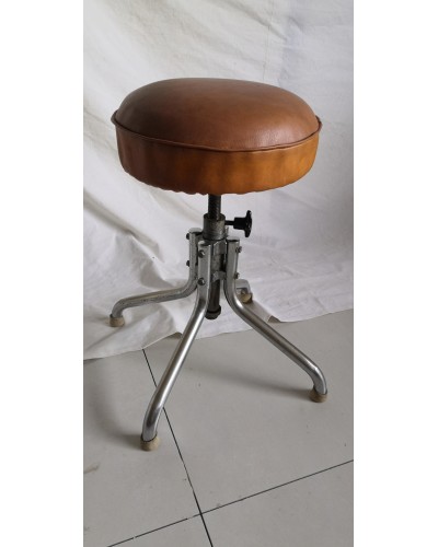 Tabouret tournant vintage assise en cuir et pieds chromés